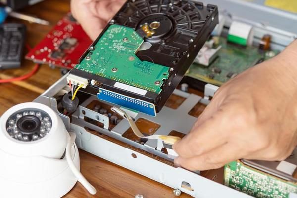 Technician remove a hard disk drive